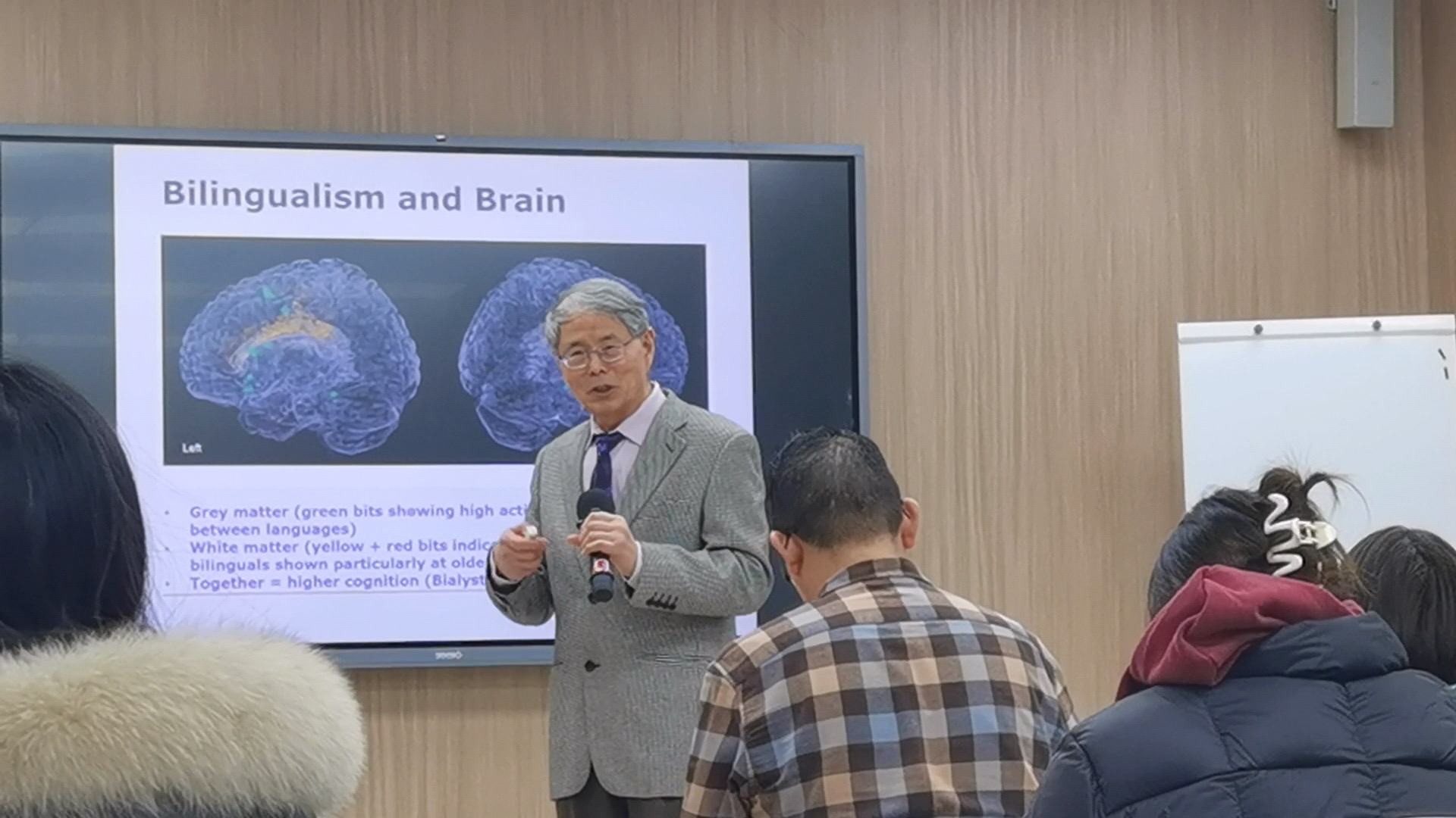 Professor Feng presenting on Bilingualism and Brain